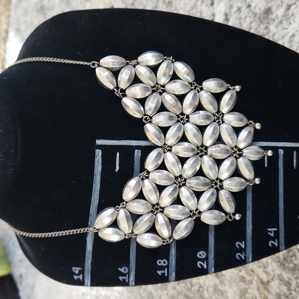 Silvertone flower‎ bib necklace